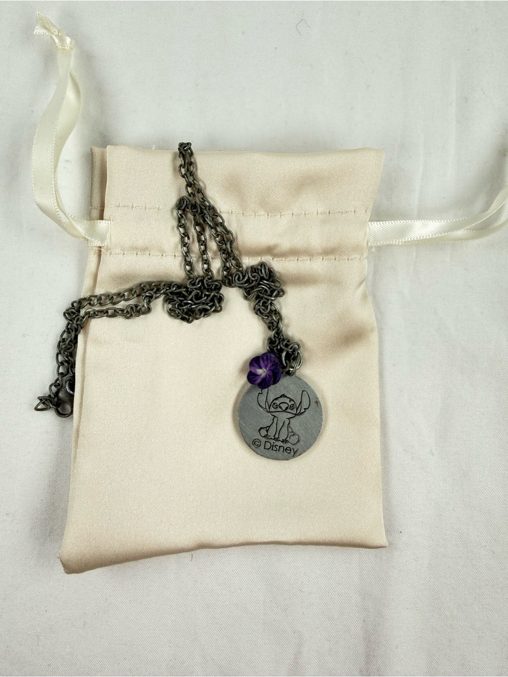 Disney Silver Tone Stitch Pendant Necklace with Purple Floral Accent